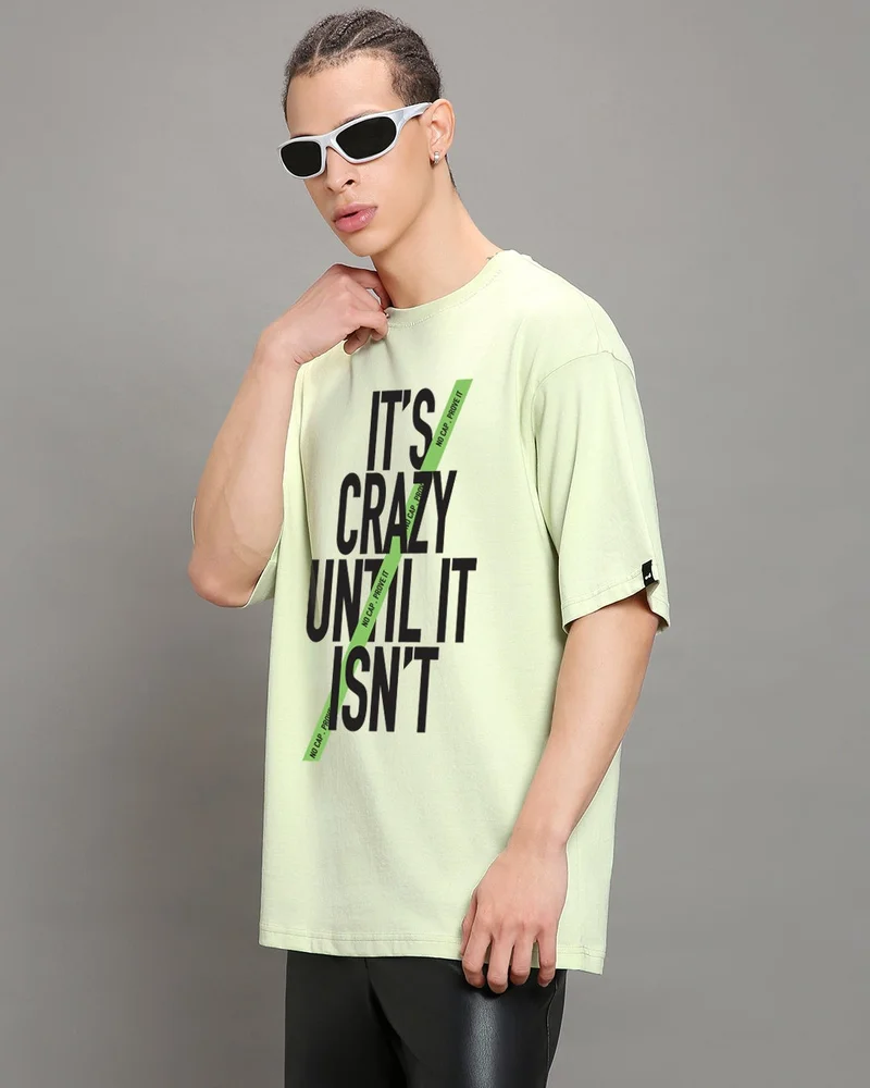 بيواكوف تيشيرت رجالي كبير بطبعة إنه جنون بلون أخضر ضبابي